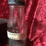 115 black see sand Bottel by joanna cronemiller