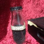 112 black magic Bottel by Joanna Cronemiller